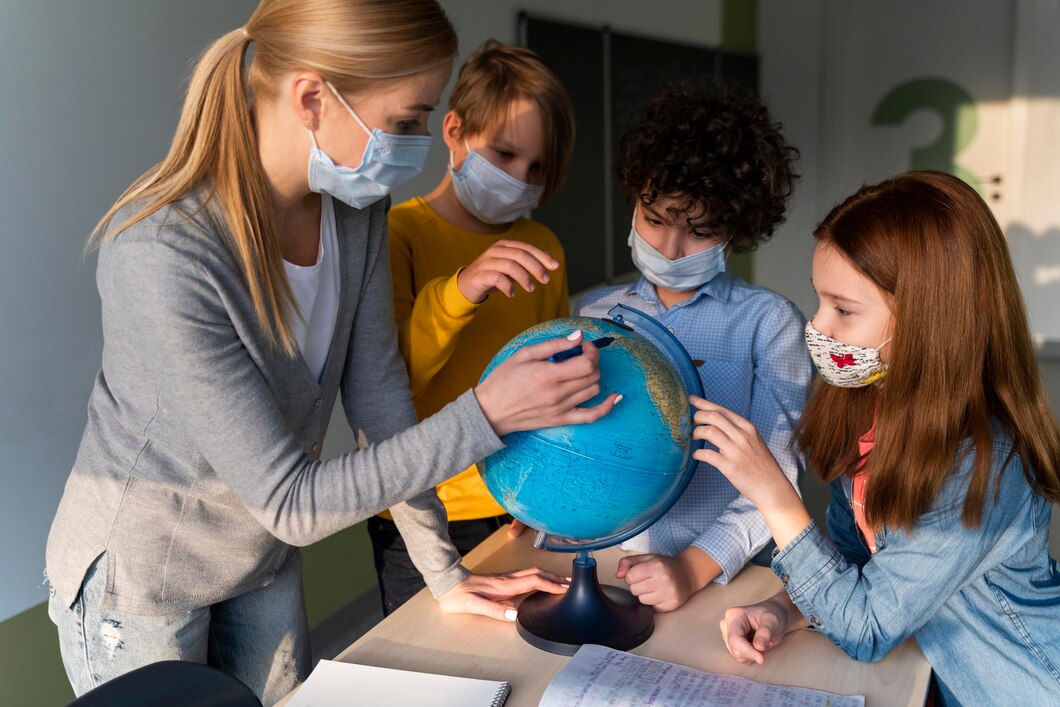 female-teacher-with-medical-mask-teaching-geography-with-earth-globe-class_23-2148848308 Cosmetic Dentistry in Batesville, IN